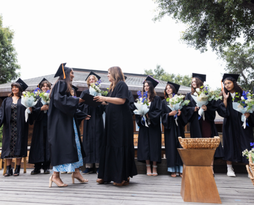 High School Graduates receive diplomas